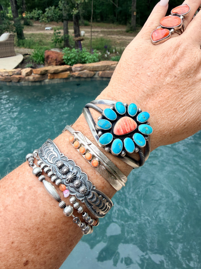 5 Stone Orange Spiny Feather Cuff