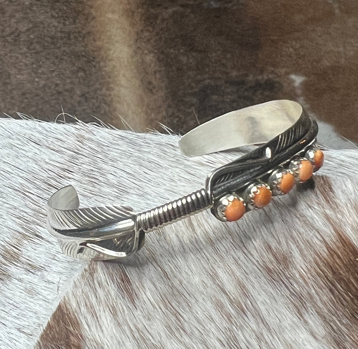 5 Stone Orange Spiny Feather Cuff