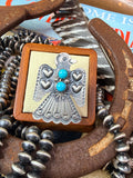 Adjustable Thunderbird Ring with Turquoise and Detailed Stamping