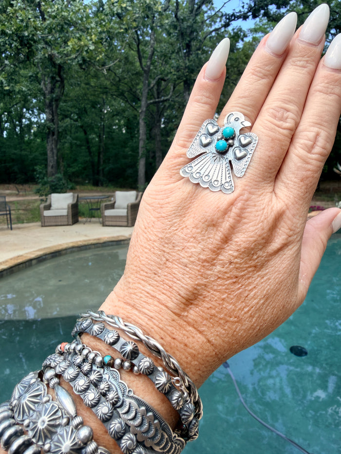 Adjustable Thunderbird Ring with Turquoise and Detailed Stamping