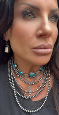 Authentic Handmade and stamped Native made barrel and saucer bead earrings