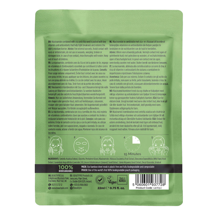 Green face mask packaging with text and icons on a white background