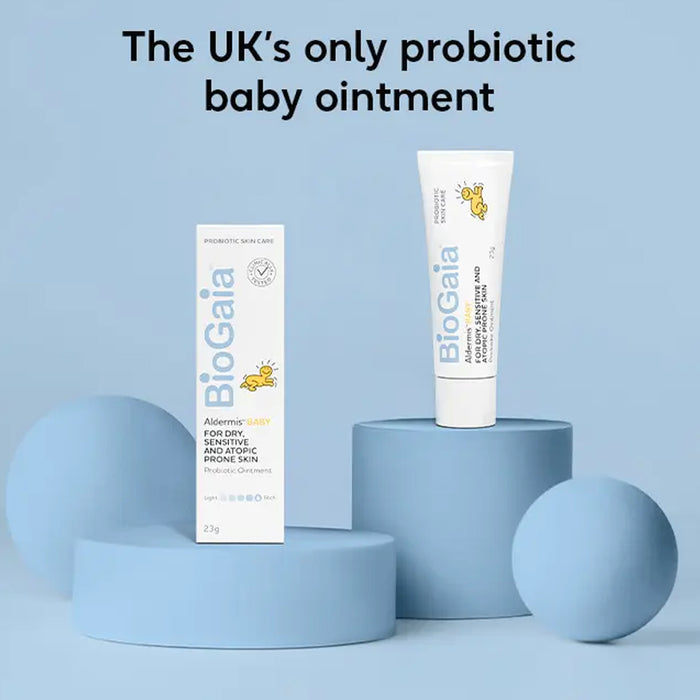 Biogaia probiotic baby ointment packaging on a blue background