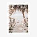 A photo wall art print featuring steps leading down to the beach of an Australian coastal town