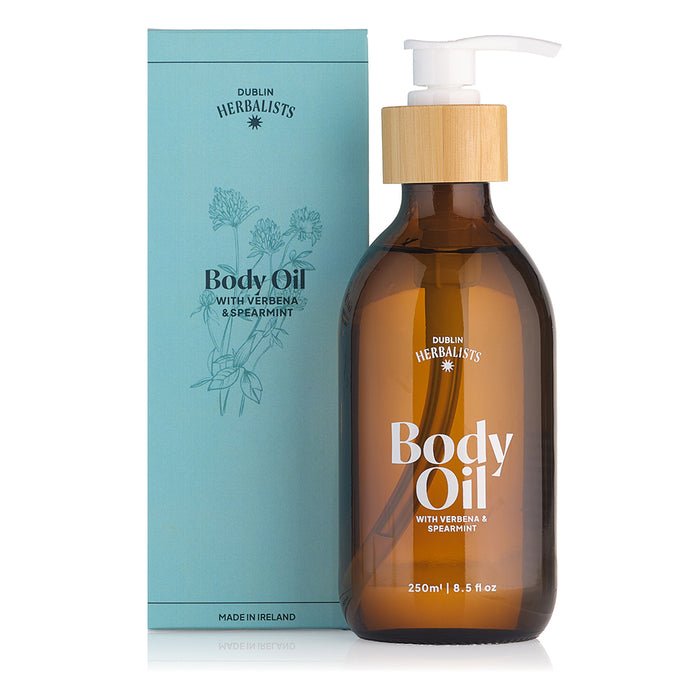 Brown bottle of Dublin Herbalists body oil with a pump