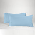 Funda de almohada algodón azul celeste dos piezas abertura lateral
