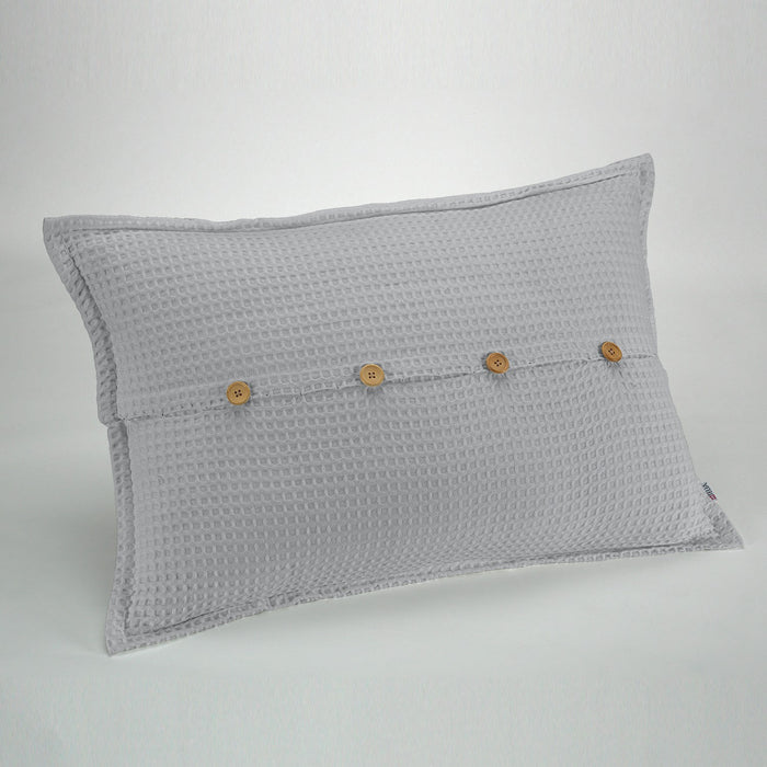 Funda de cojín tejida Banús 50x75 cm color perla. Cierre con botones