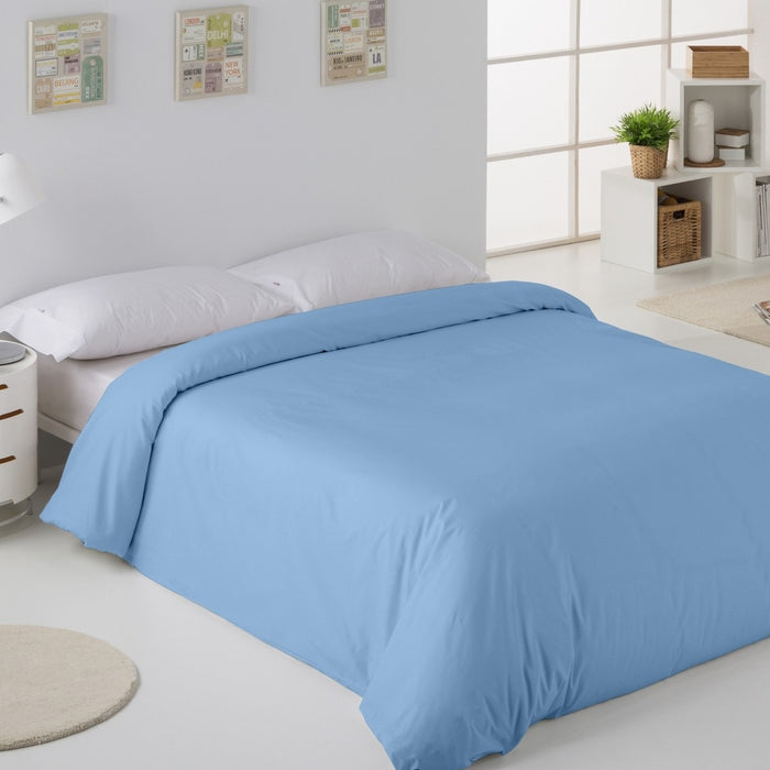Funda nórdica lisa 50-50 azul claro escena de cama