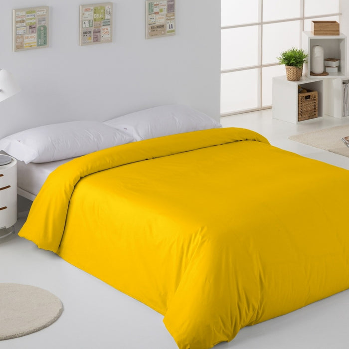 Funda nórdica lisa 50-50 mostaza escena de cama
