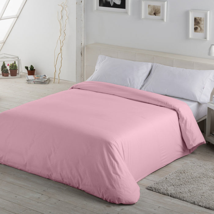 Funda nórdica lisa 50-50 rosa escena de cama