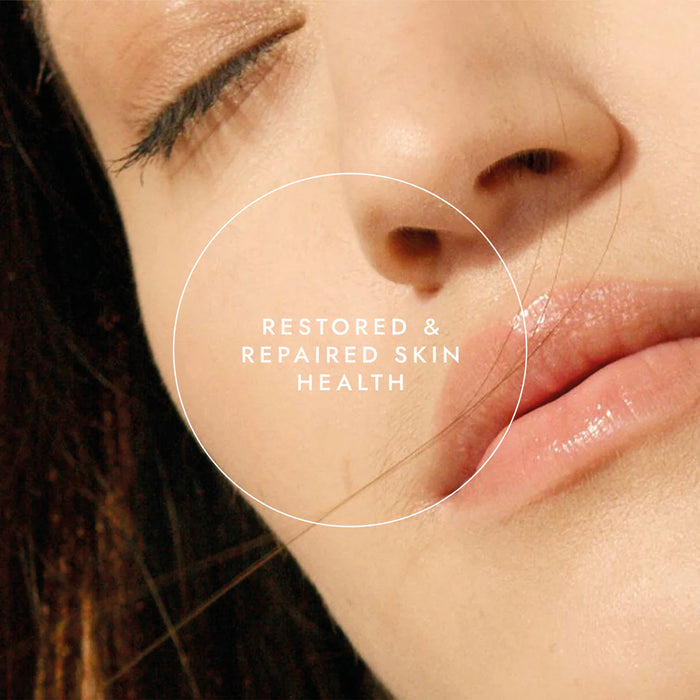 Close-up of a person's face with text 'Restored & Repaired Skin Health' on a blurred background