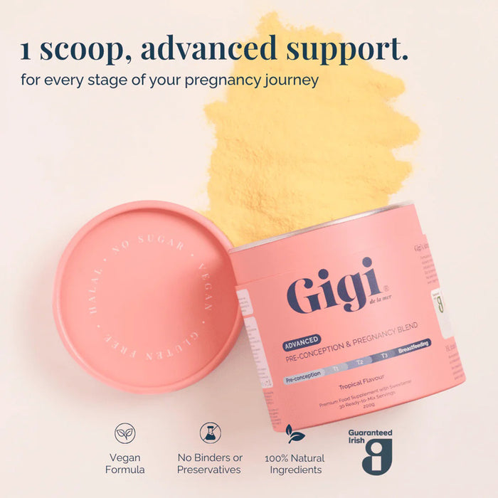 A pink tub of Gigi Pre-conception & Pregnancy Blend supplement with its lid placed beside it with a yellow powder.