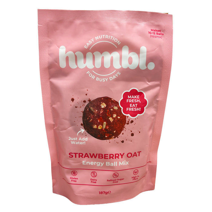 A pink stand-up pouch of Humbl. Strawberry Oat Energy Ball Mix,