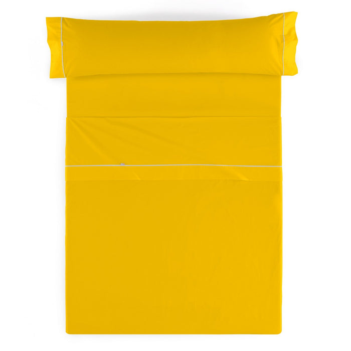 Juego de sábanas liso mostaza vista cenital