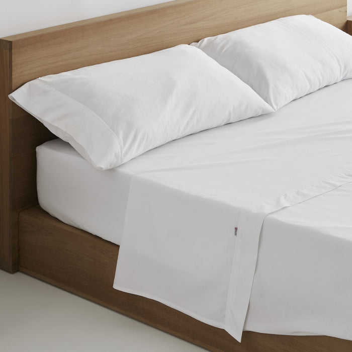 Juego de sábanas percal 200 hilos blanco escena de cama