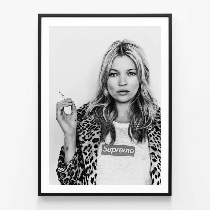 Kate Moss wearing a Supreme T-shirt wall art print in black frame