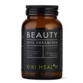 Black supplement bottle labeled 'Beauty with Ceramides' on a white background