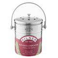 Kilner Kitchen Composter in polished stainless steel with a matching metal handle and lid, featuring a pink and white label with green leaf graphics.