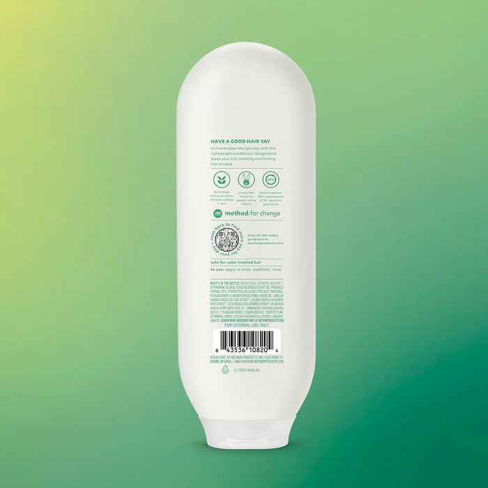 White bottle with green text on a gradient green background
