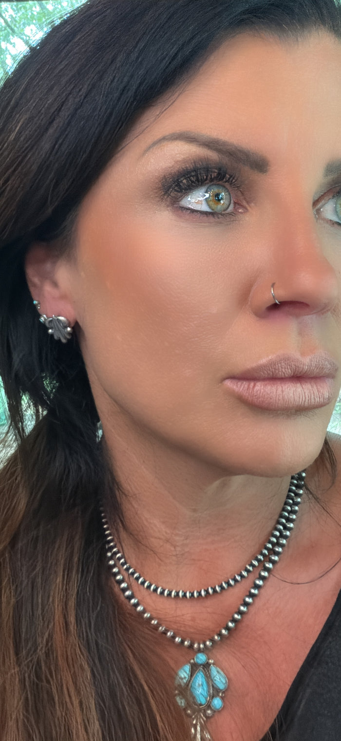 Native Made Sterling Silver Scroll Earrings by Rita Largo