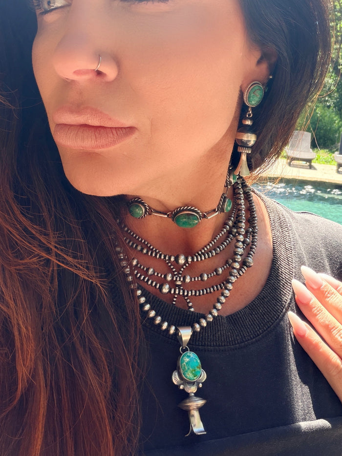 Native Made Sterling Silver & Sonoran
Mountain Turquoise Blossom Pendant by Juanita Long