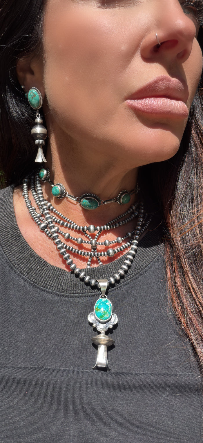 Native Made Sterling Silver & Sonoran
Mountain Turquoise Blossom Pendant by Juanita Long