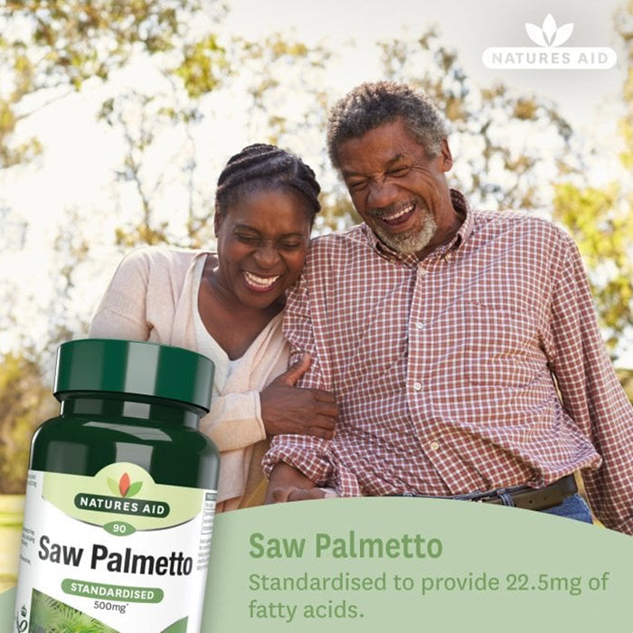 Couple standing outdoors with a bottle of Natures Aid Saw Palmetto in the foreground.