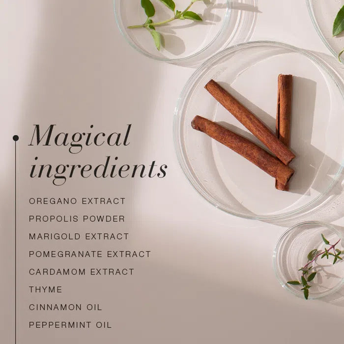Cinnamon sticks on a white plate with a list of ingredients on a light background