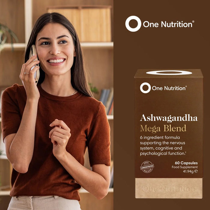 Woman talking on a phone with One Nutrition Ashwagandha Mega Blend supplement box next to her