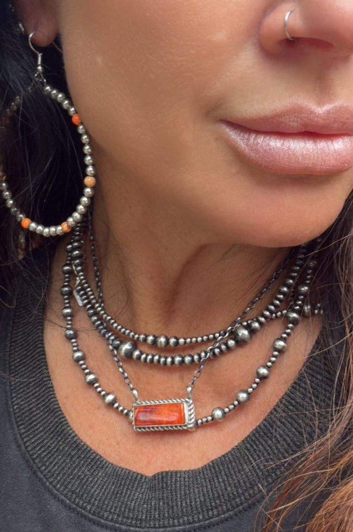 Orange Spiny Bar Necklace by C Belone