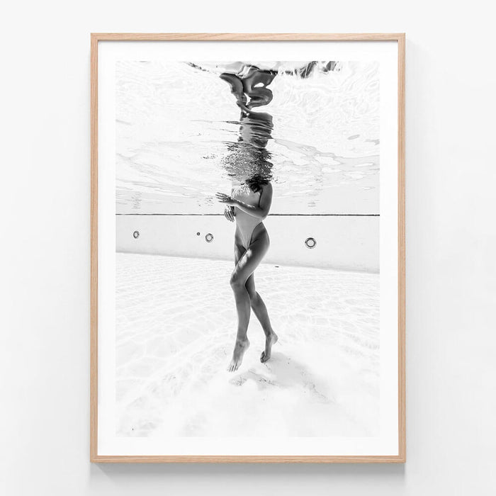 Pool Girl wall art print in oak frame