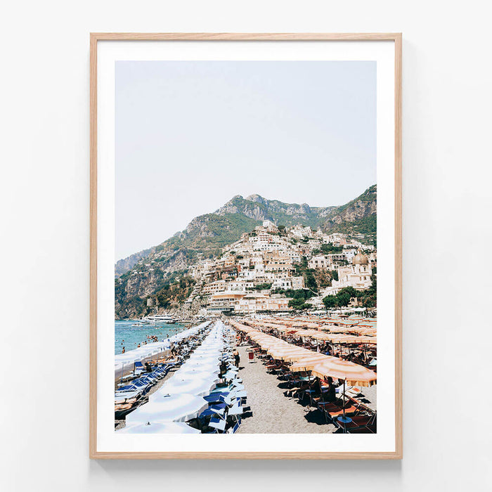 Positano Umbrellas wall art print in oak frame
