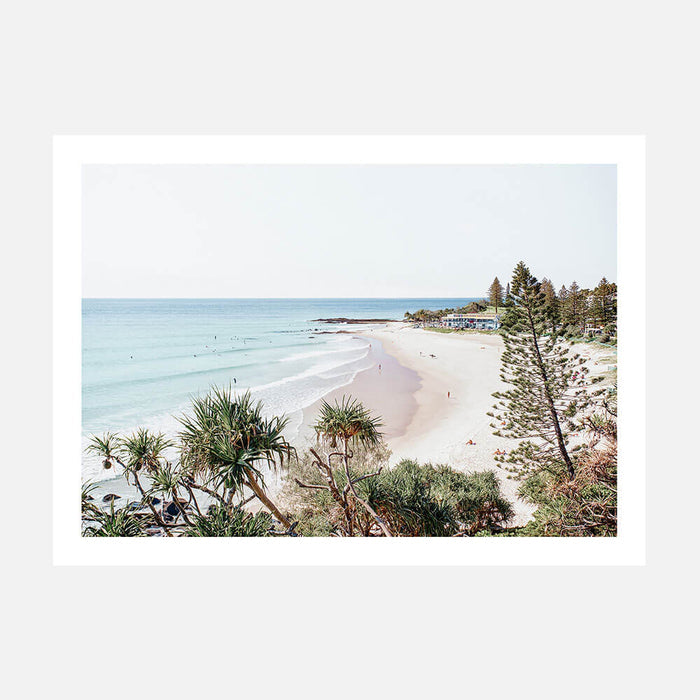 A coastal phot print of Rainbow Bay beach