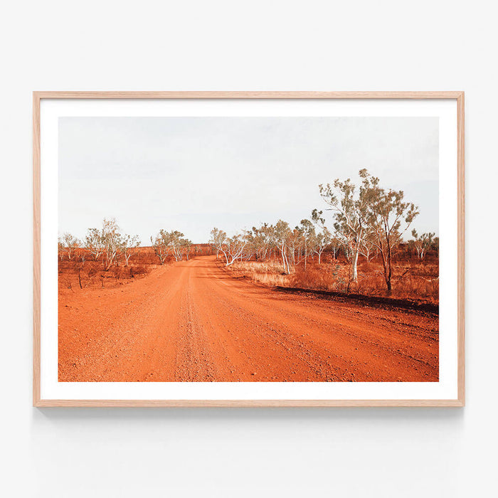 Red Outback Road wall art print in oak frame
