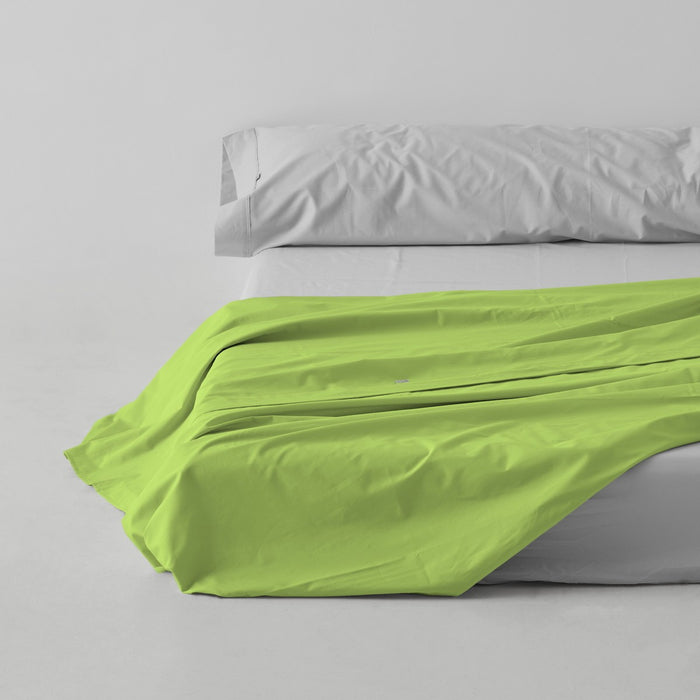 Sábana encimera algodón poliéster kiwi escena de cama