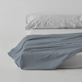 Sábana encimera algodón acero escena de cama