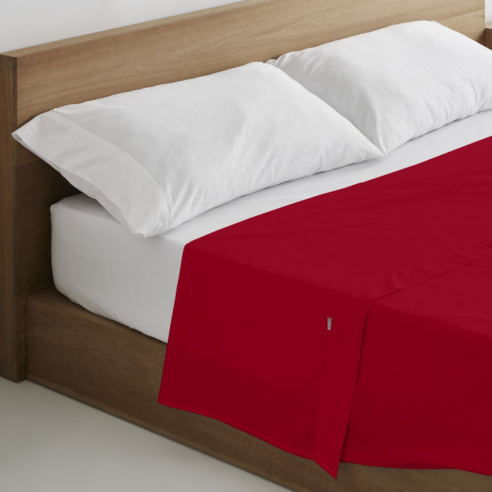 Sábana encimera algodón burdeos escena de cama