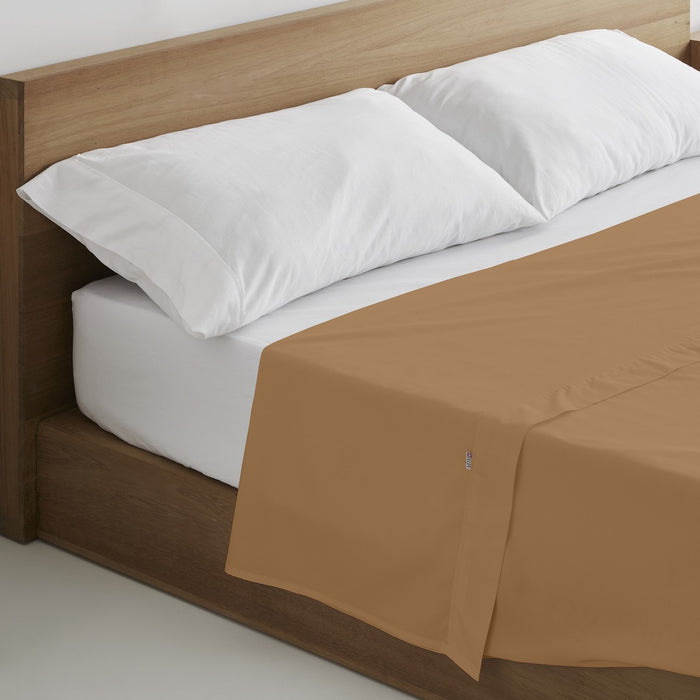 Sábana encimera algodón marrón escena de cama