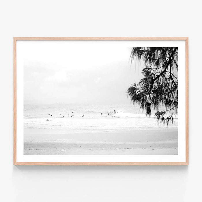 A framed photo wall art print featuring Snapper Rocks beach in black and white