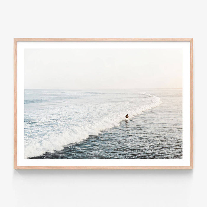 Solo Surfer wall art print in oak frame