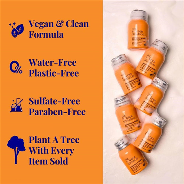 Orange and white product packaging with text highlighting vegan, clean, water-free, plastic-free, sulfate-free, paraben-free, and environmental benefits.