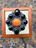 Tony Yazzie 8 Onyx Stones Surrounded by Orange Spiny Oyster with Sterling Silver detailed band. Adjustable Ring