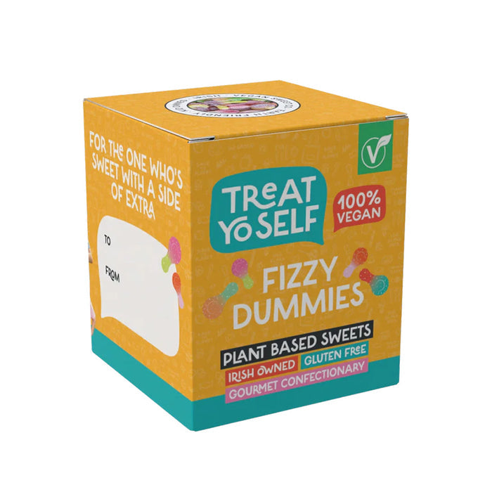 A box of Treat Yo Self Fizzy Dummies plant-based sweets, featuring a bright yellow-orange packaging design with teal and red accents, on a plain white background.