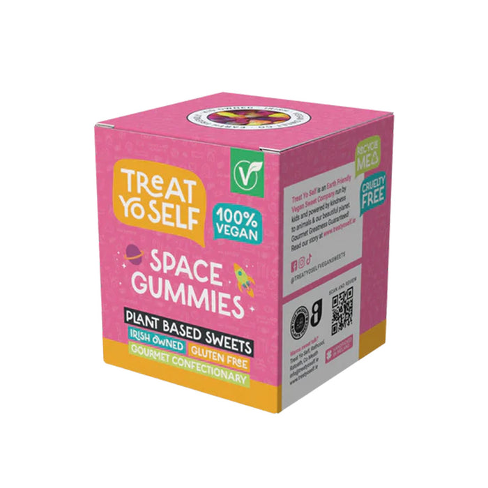 A pink box of Treat Yo Self Space Gummies plant-based sweets,.