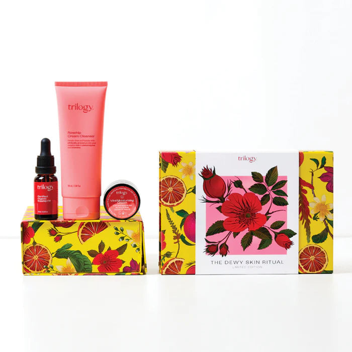 Triology skincare products with colorful packaging on a white background