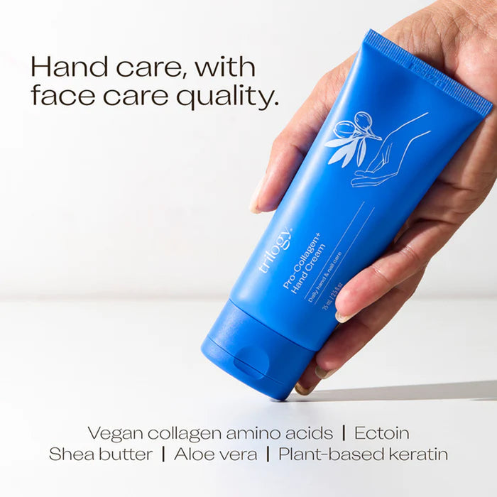 Hand holding a blue tube of hand cream with text about ingredients and benefits on a white background