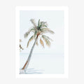 A wall art print with a palm tree on a tropical beach