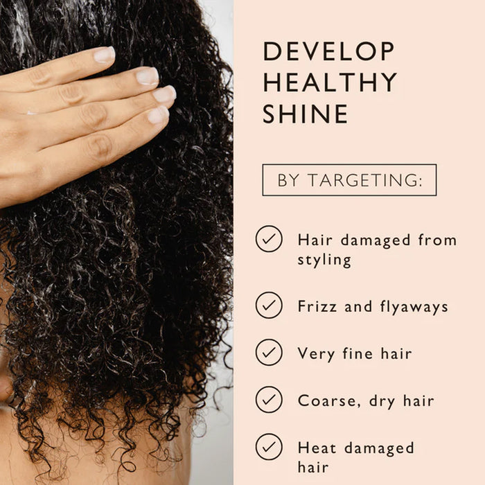 Person with curly hair holding it, alongside text on developing healthy shine with hair care tips.