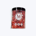 A clear plastic jar of VERA MIKLAS Freeze Dried Strawberries.
