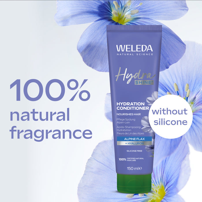 Weleda Hydra Shine conditioner tube with blue flowers in the background